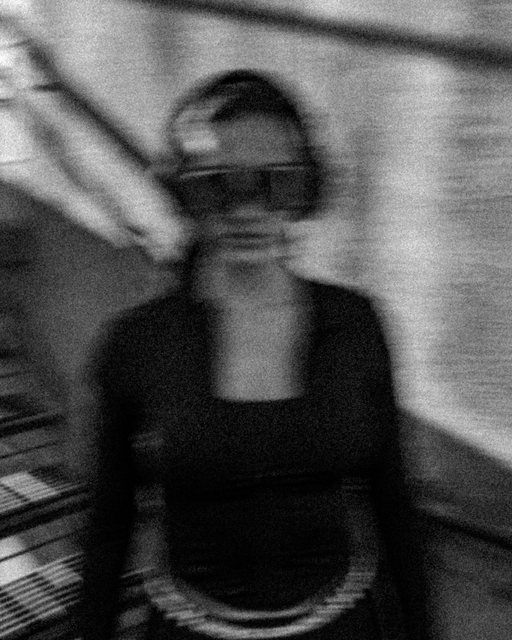 Black-and-white athlete portrait with motion blur