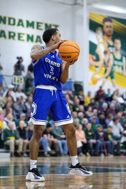 Lakers basketball player preparing to take a shot