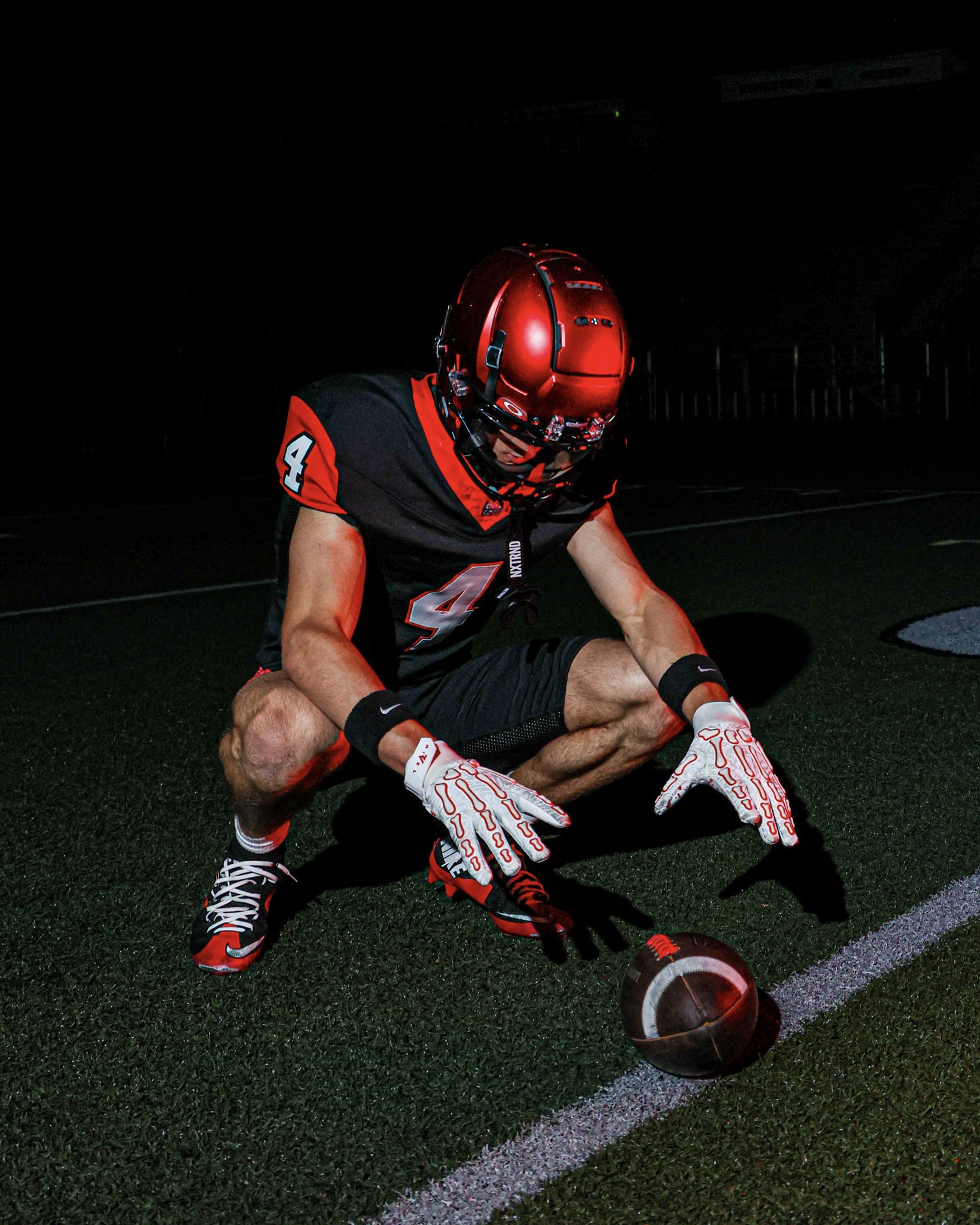 Athlete portrait with red lighting