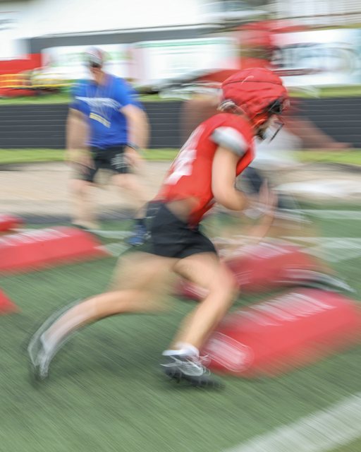Football practice captured with motion blur